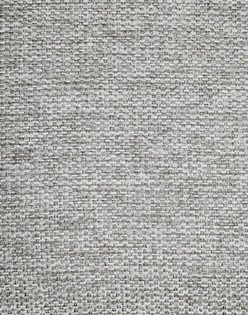 Nahaufnahme eines grauen Stoffmusters, das für einen Armlehnstuhl verwendet wird, aus der Vogelperspektive.