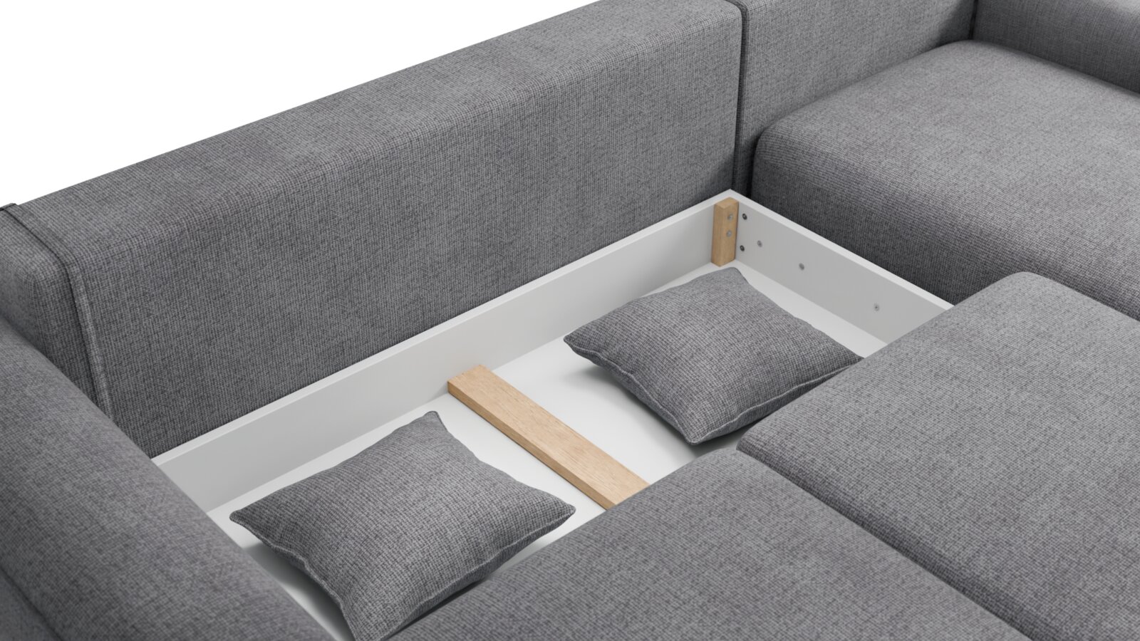 Graue Rundecke mit Stauraum, von oben betrachtet, mit zwei Kissen im Inneren.