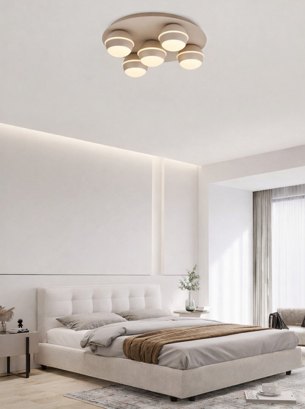 Moderne led-plafondlamp met meerdere ronde lichtelementen, van onderaf gezien in een stijlvolle slaapkamer.