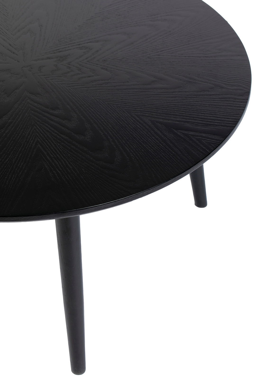 Runder schwarzer Esstisch mit Holzmaserung, Ansicht von oben.