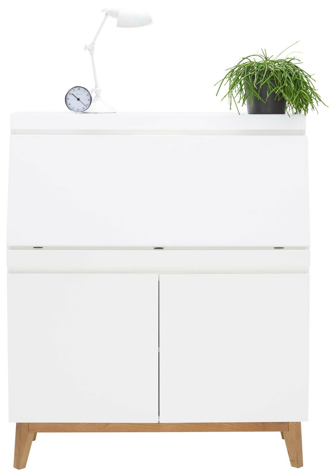 Moderner weißer Sekretär mit Holzbeinen, dekoriert mit einer Tischlampe und einer Pflanze, frontal betrachtet.