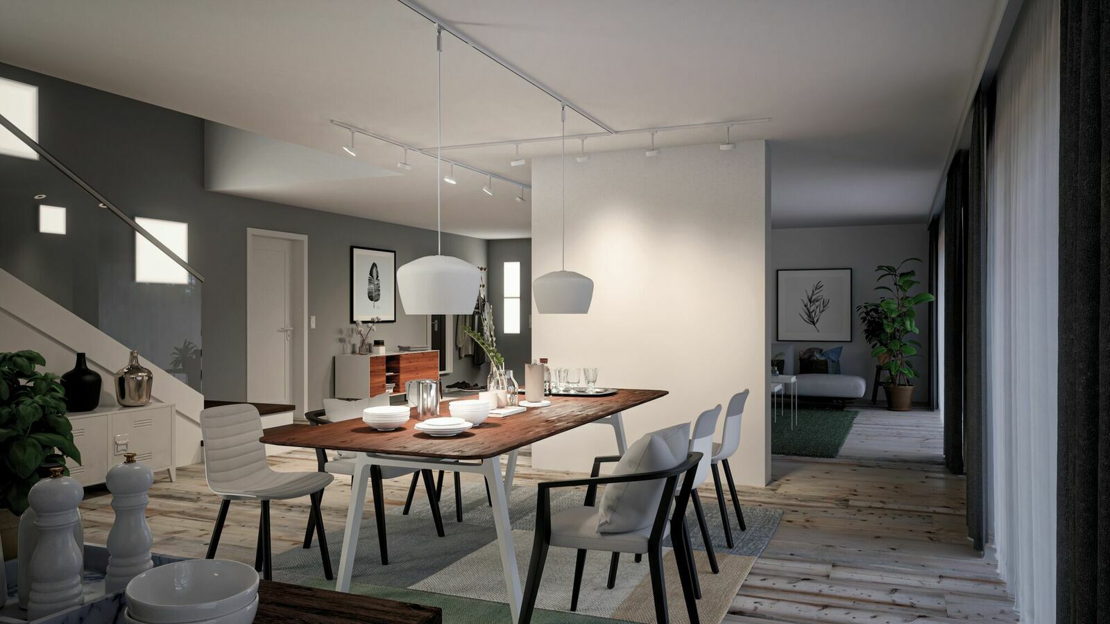 Moderne Esszimmeransicht mit stilvollem Holztisch, weißen Stühlen und eleganter Beleuchtung von der Decke.