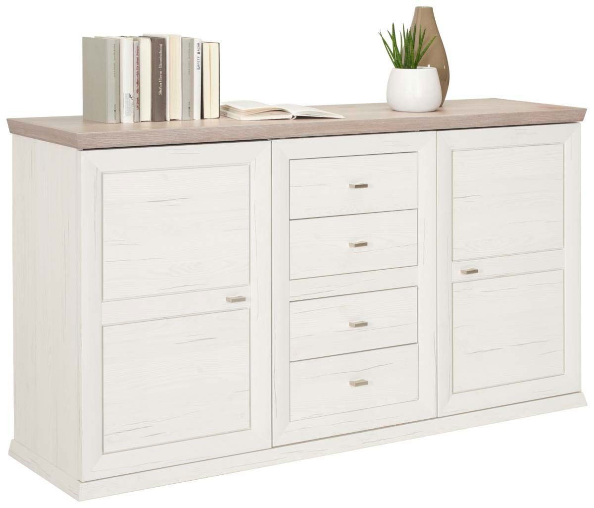Weißes Sideboard mit Holzplatte, zwei Türen und vier Schubladen, dekoriert mit Büchern und einer Pflanze, seitliche Perspektive