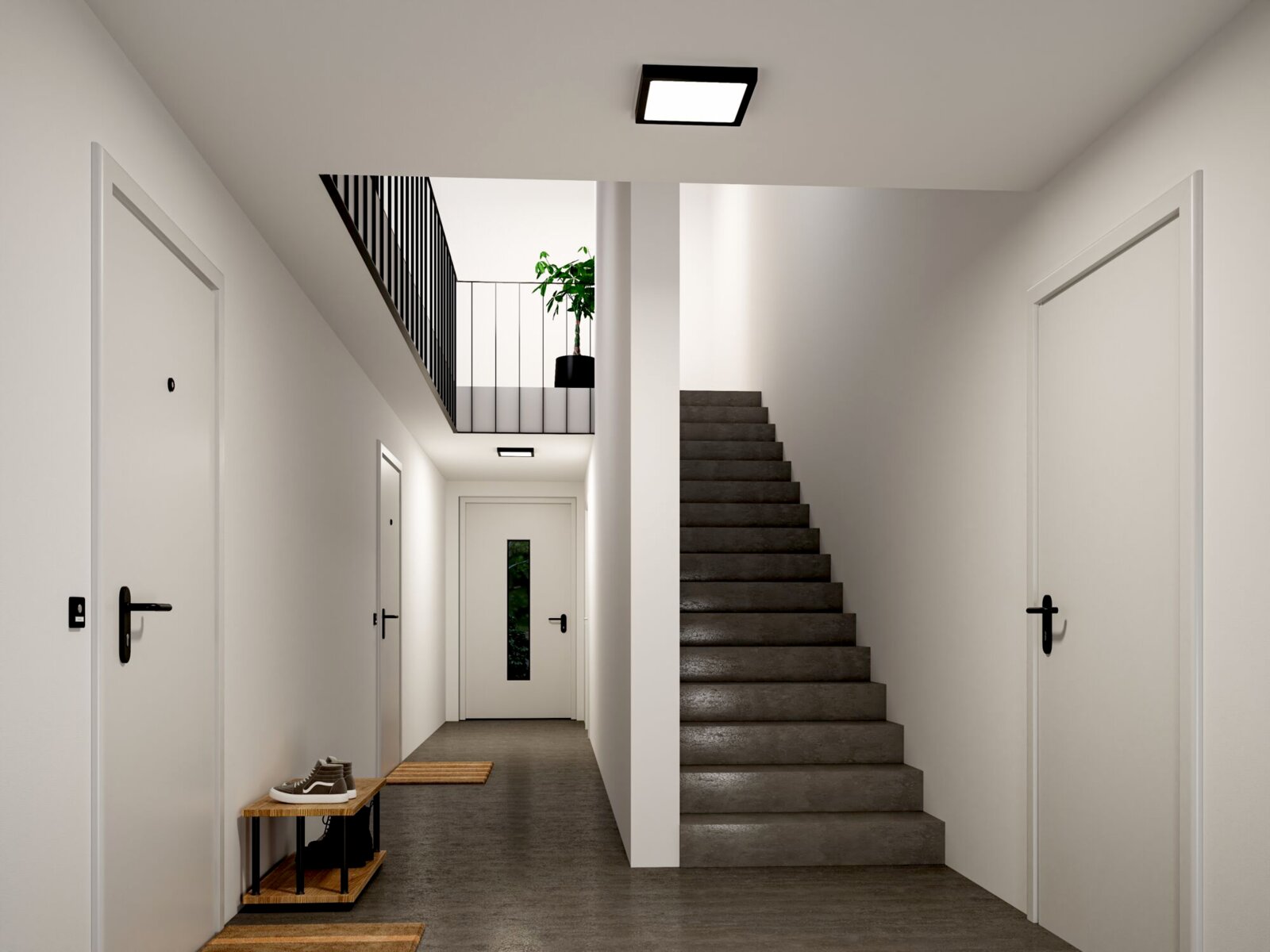 Moderner Eingangsflur mit weiß gestrichenen Wänden, grauer Treppe und quadratischen Deckenleuchten, Blick frontal aus Augenhöhe in den Flur Richtung Treppenaufgang.