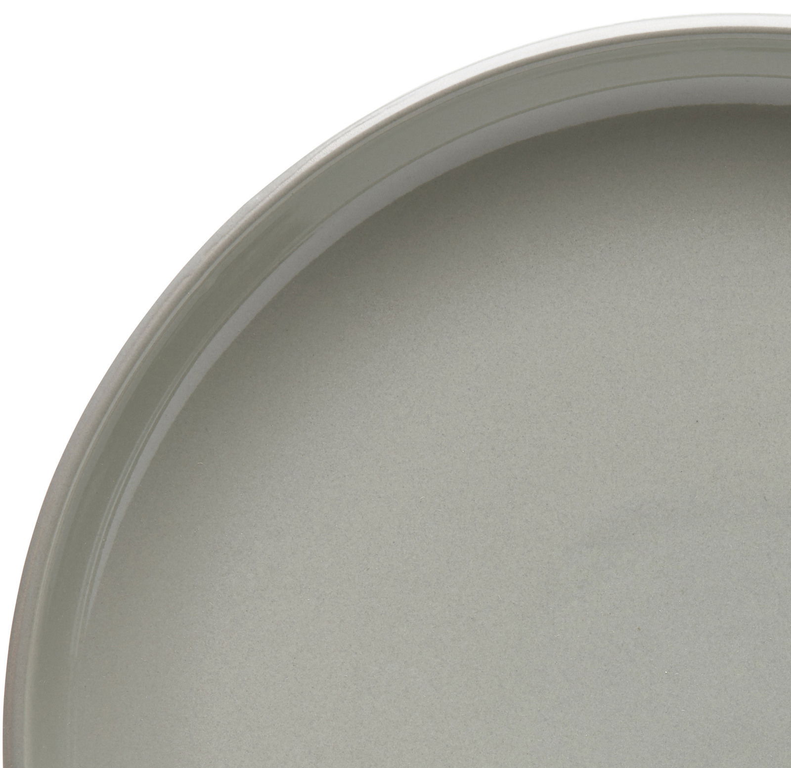 Nahaufnahme eines grauen Tellers aus dem 16-teiligen Kombiservice Linz, von oben betrachtet.