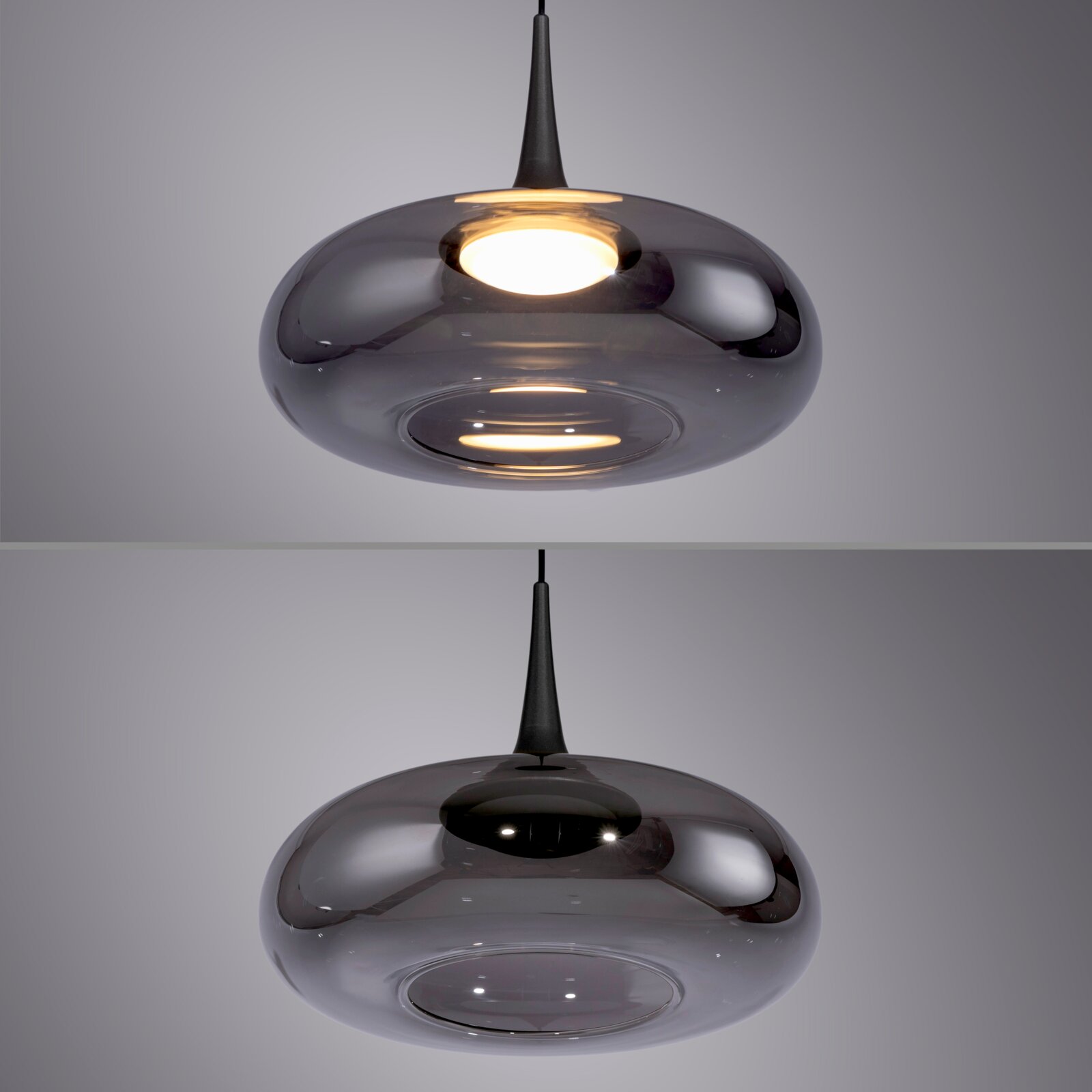 Moderne Pendelleuchte mit rauchgrauem, glänzendem Glas-Schirm in flacher, runder Form und schwarzem Kabel, warm leuchtend; Ansicht leicht von unten (Untersicht)