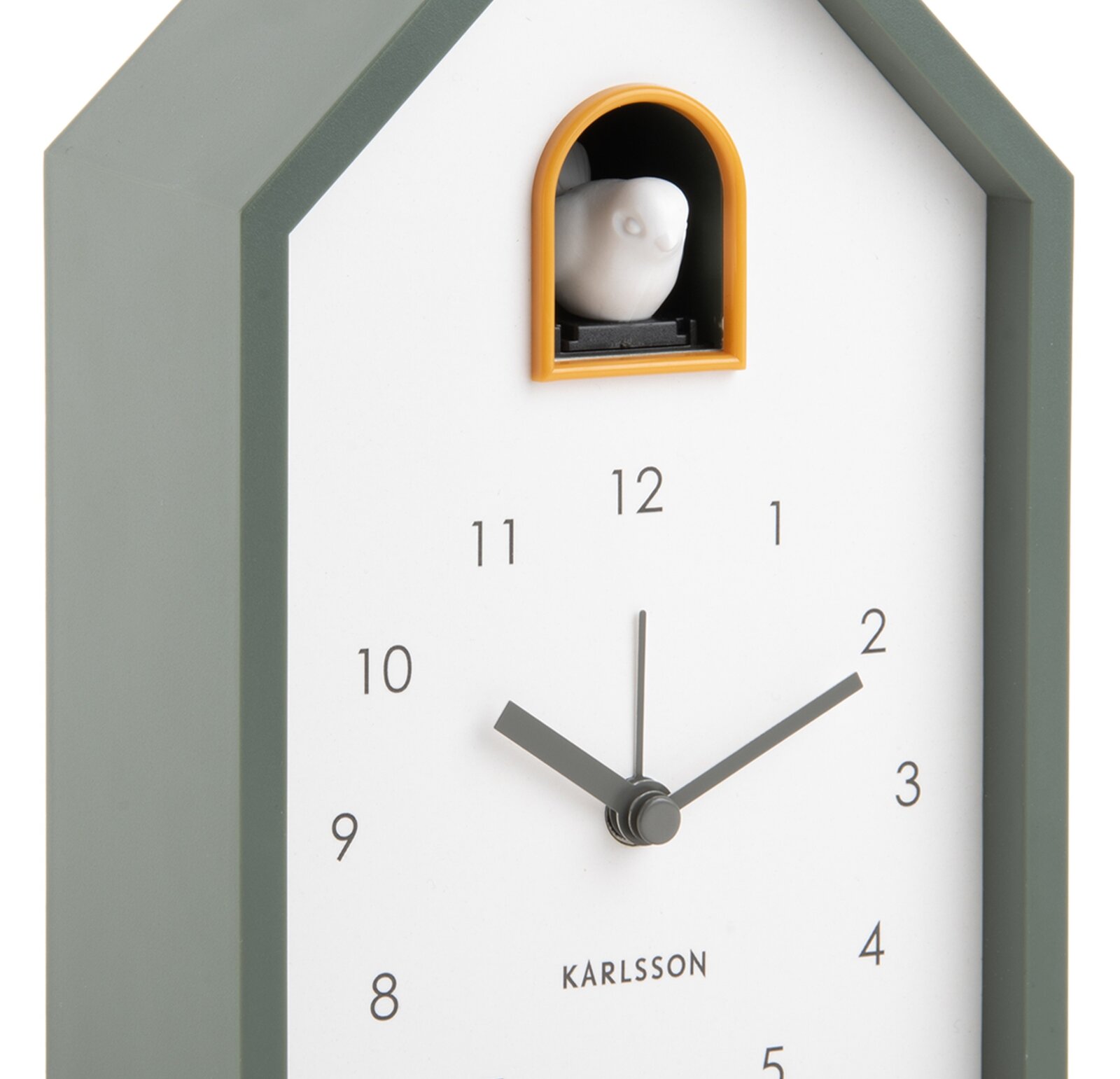 Moderne KARLSSON-wekker in de vorm van een huisje met koekoek, zijaanzicht