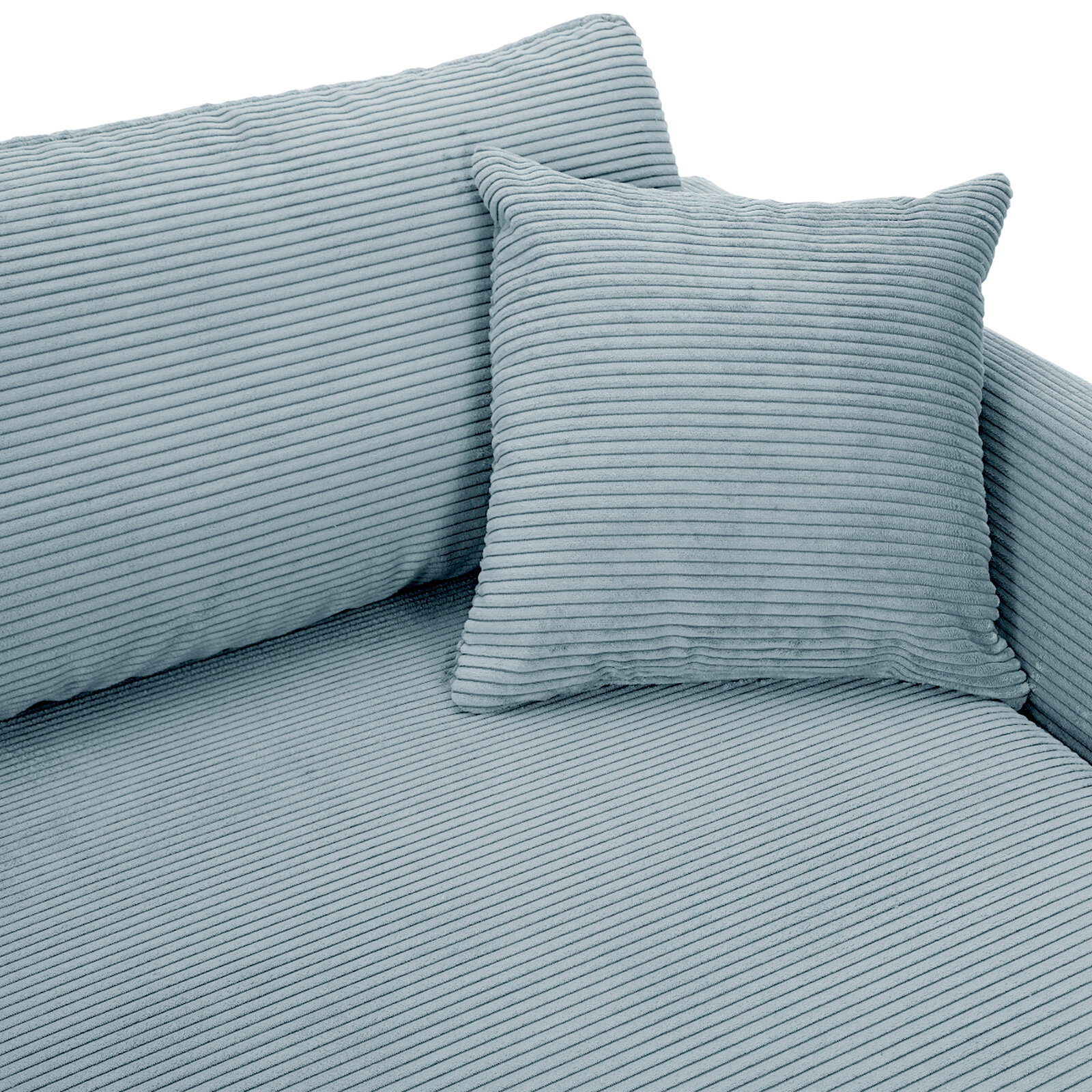 Nahaufnahme einer Rundecke mit geripptem Stoff in hellblau, inklusive passendem Kissen.