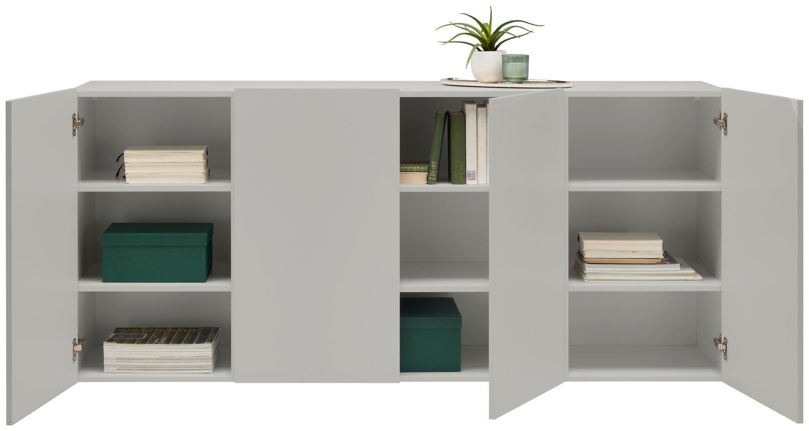 Hängesideboard mit geöffneten Türen, gefüllt mit Büchern und einer grünen Box, aus frontaler Perspektive.