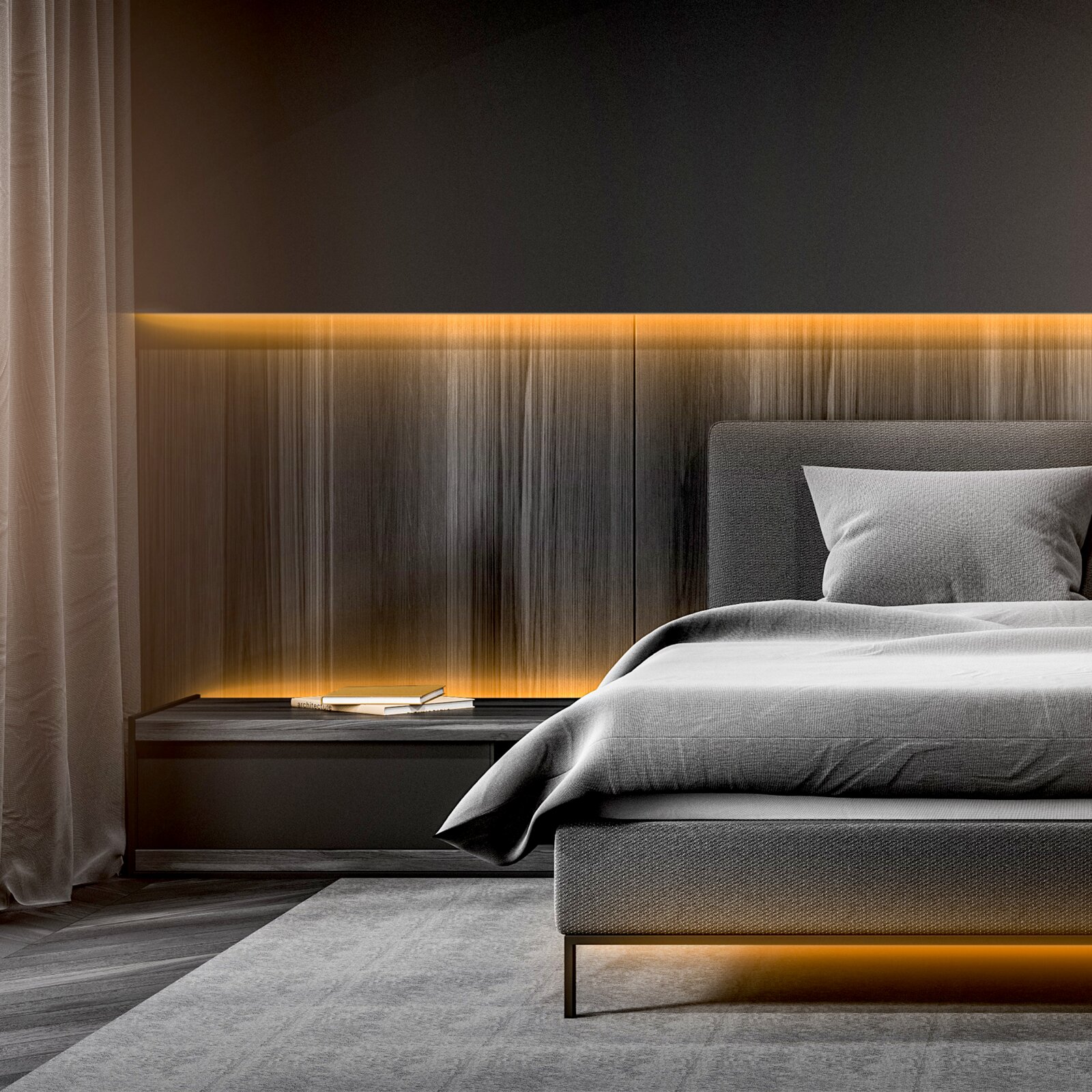 Modernes Schlafzimmer mit gepolstertem grauen Bett, warmem LED-Lichtband an der Wandverkleidung und Nachttisch mit Buch, frontal aus leicht seitlicher Perspektive aufgenommen.