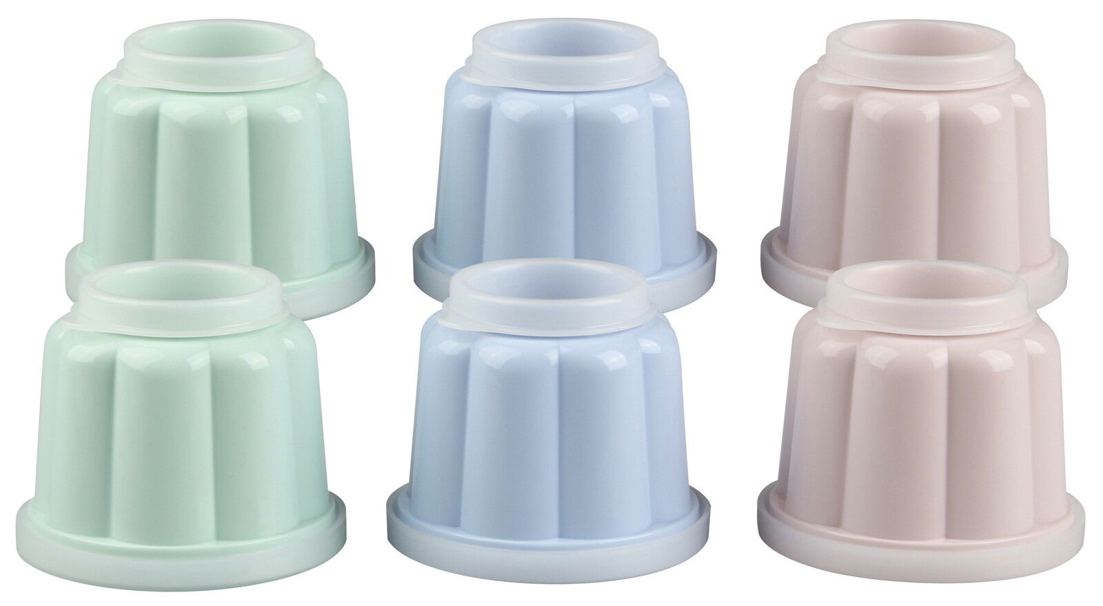 Dr. Oetker Puddingform 6-tlg. Sechs Puddingformen in Pastellfarben, jeweils in Grün, Blau und Rosa, aus einer leicht erhöhten Perspektive fotografiert.