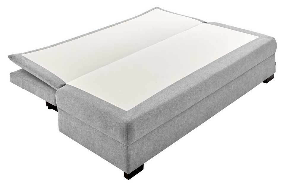 Graues Funktionssofa in Liegeposition, seitliche Perspektive