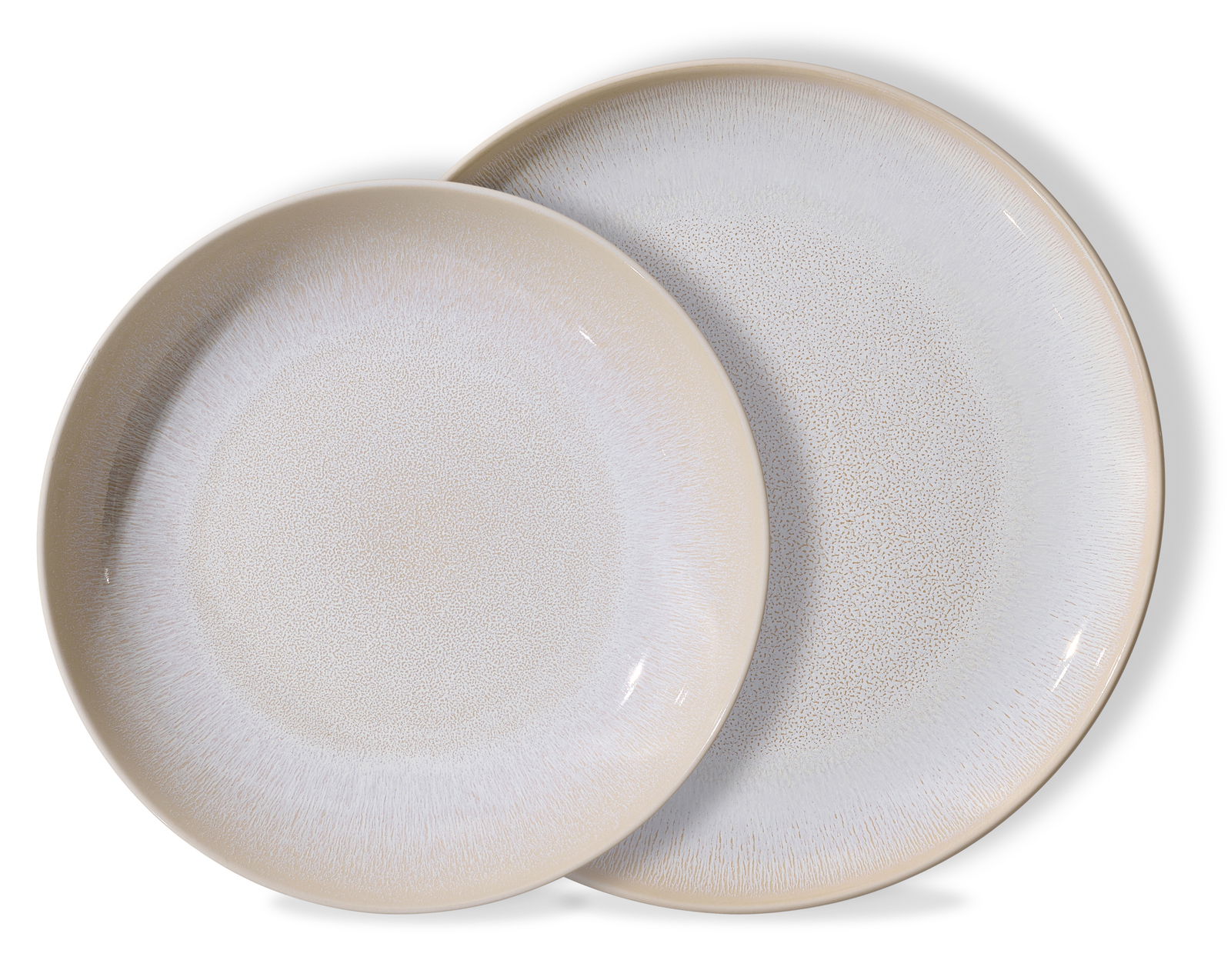 Zwei übereinanderliegende Teller aus dem Frühstücksset Laredo, 12-teilig, in einer Draufsicht. Die Teller haben ein dezentes, helles Design mit feiner Struktur.