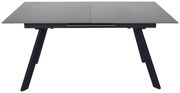 Moderner Esstisch mit grauer Tischplatte und schwarzen, schrägen Beinen, Frontalansicht