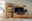 Moderne Wandkombination aus Holz mit Vitrine, TV-Schrank und Wandregal, frontal fotografiert.