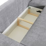 Innenansicht eines grauen Sofas mit Stauraum, Perspektive von oben.