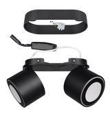 Zweifacher LED-Einbau- und Aufbauspot TAURUS in schwarzer Farbe, von oben betrachtet, mit sichtbaren Kabeln und Anschluss.