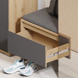 Kompaktgarderobe TORINO mit offener Schublade und grauem Sitzpolster, seitliche Perspektive