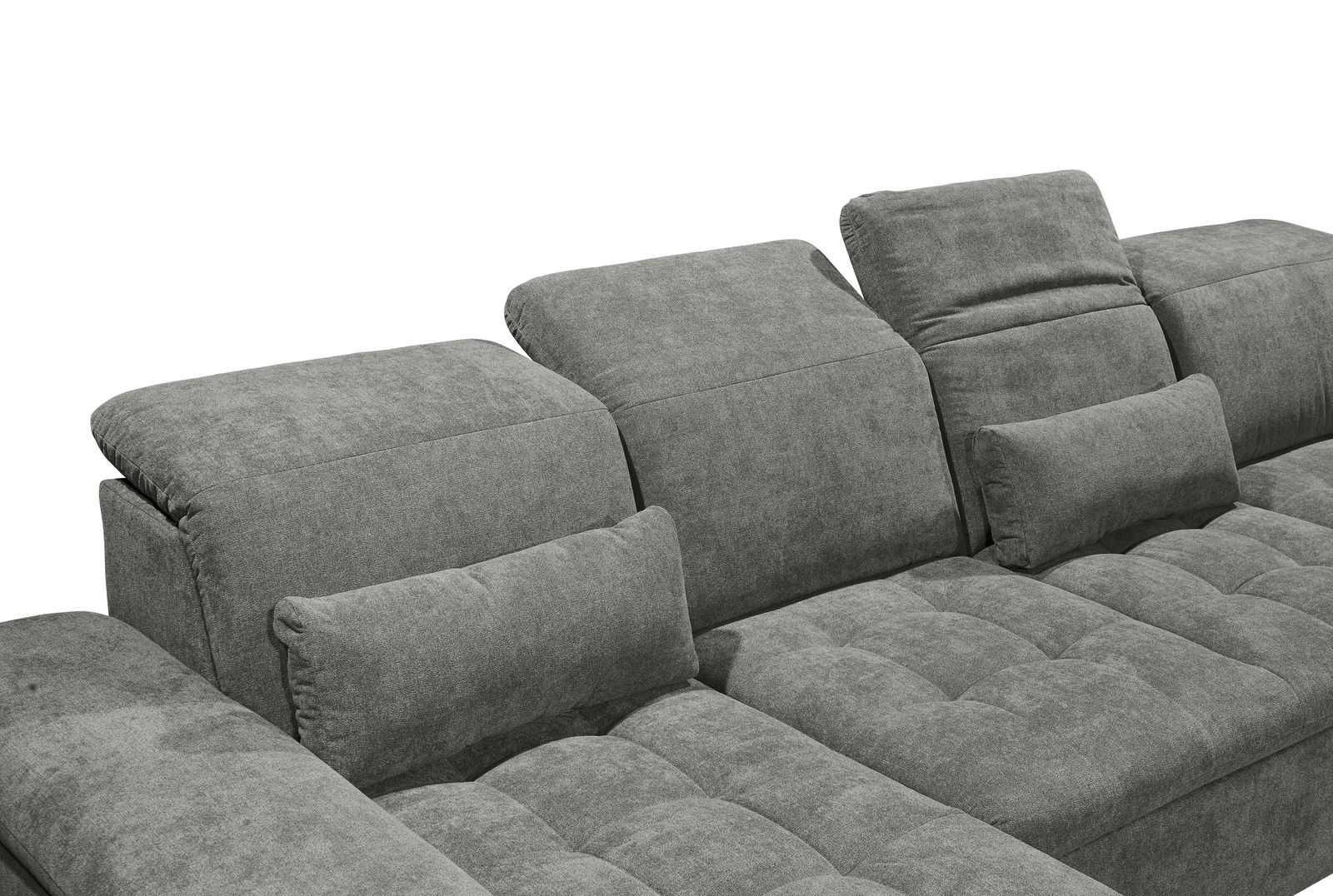 Graues Sofa mit verstellbaren Kopfstützen und Kissen, seitliche Perspektive