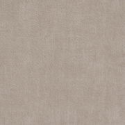 Nahaufnahme eines beigen Stoffes mit weicher Textur, von oben betrachtet.