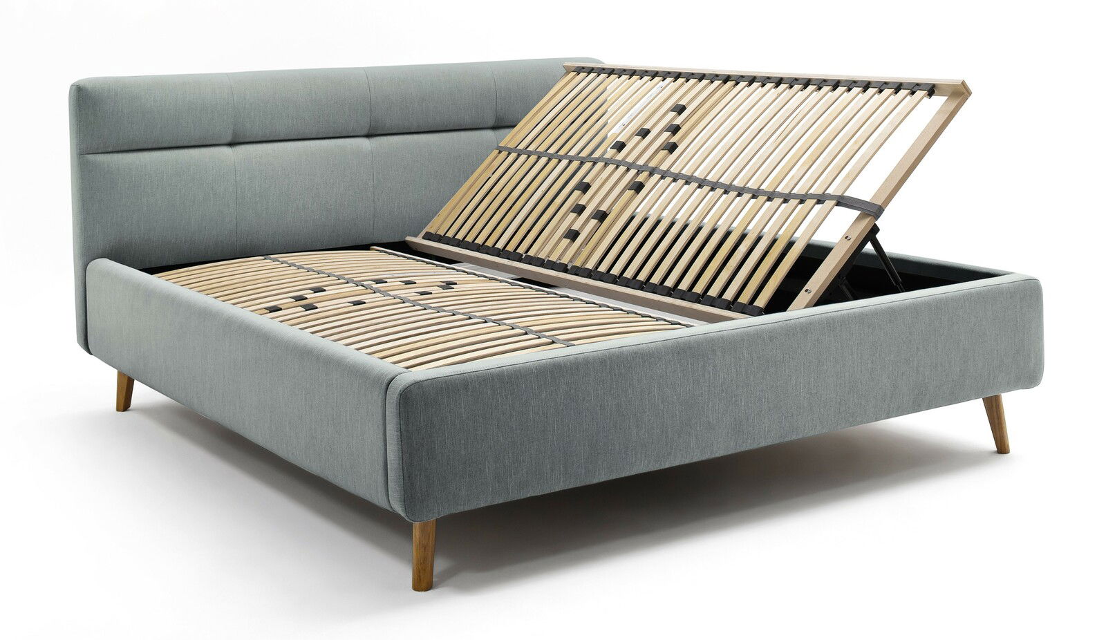 Graues Polsterbett mit hochgeklapptem Lattenrost, seitliche Perspektive