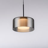 Moderne Pendelleuchte RIKA von Paul Neuhaus mit elegantem, rauchgrauem Glasschirm, seitliche Perspektive