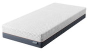 Luxe wit matras met decoratief reliëf, ademende zijrand en donkergrijze basis met oranje accent, schuin van voren en bovenaf gezien