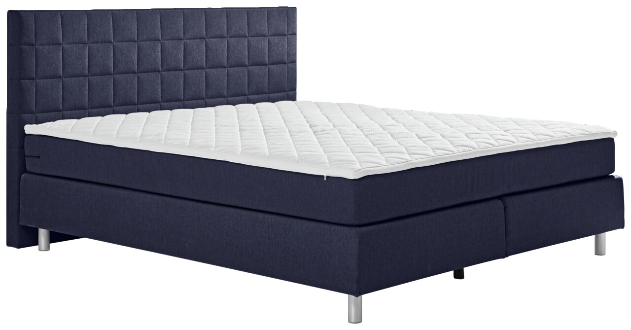 Boxspringbett in dunkelblauem Stoff mit gestepptem Kopfteil, seitliche Perspektive