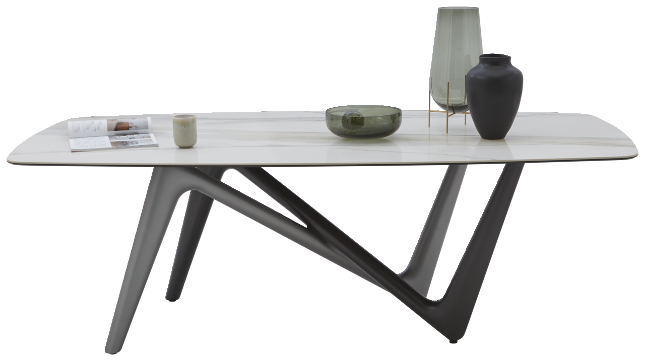 Moderner Esstisch mit weißer Tischplatte und einzigartigem, geometrischem Gestell, seitliche Perspektive.