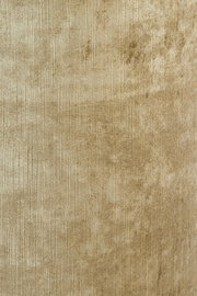 Nahaufnahme eines beigen Lampenschirms mit texturierter Oberfläche, zylindrische Form