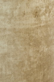 Nahaufnahme eines beigen Lampenschirms mit texturierter Oberfläche, zylindrische Form