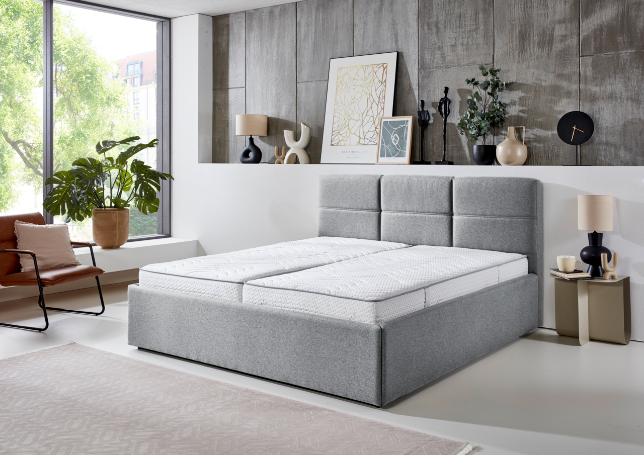 Z2 Polsterbett PB100 DURANGO Graues Polsterbett 180x200 in modernem Schlafzimmer, seitliche Perspektive