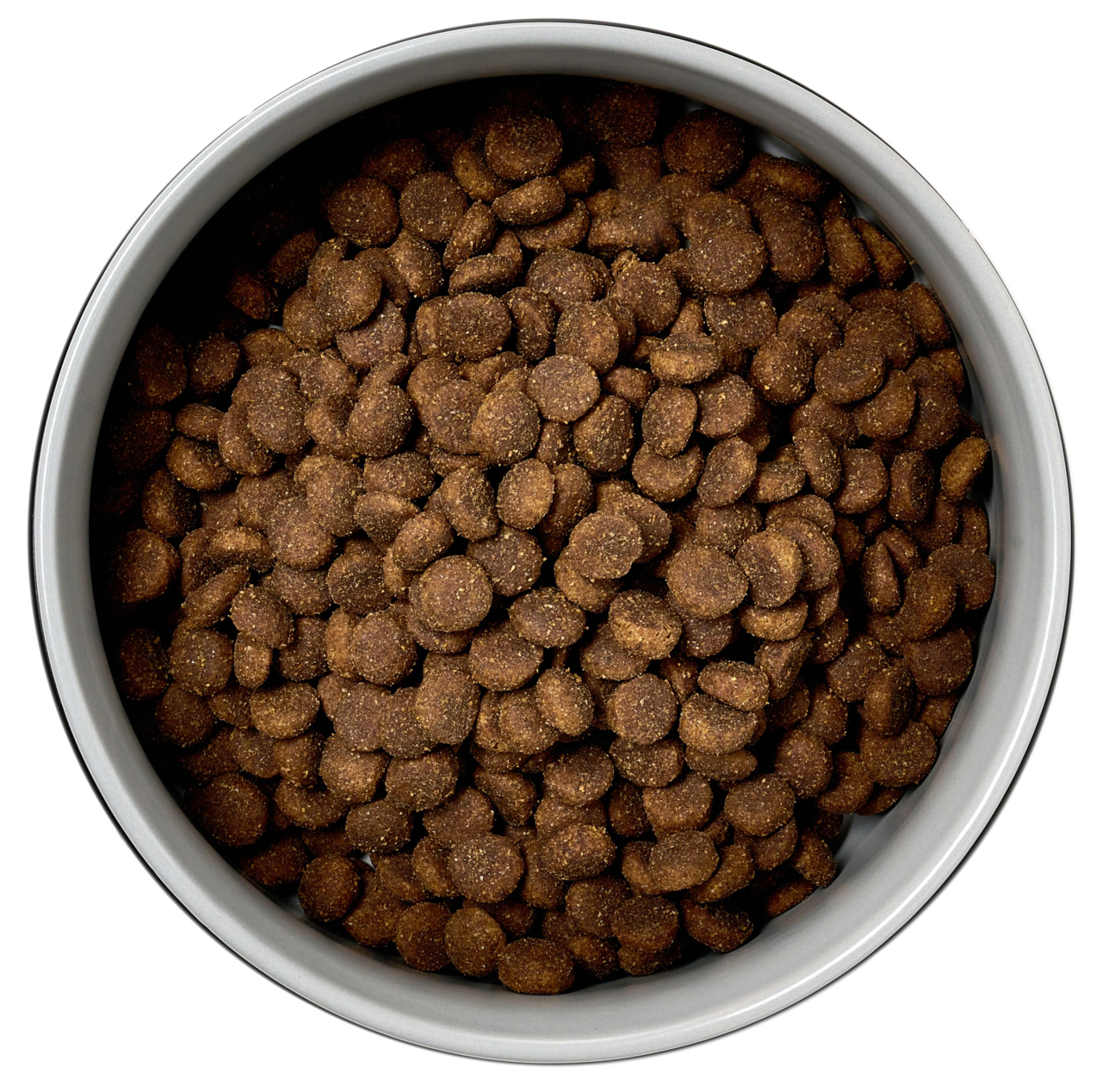 Vogelperspektive auf einen mit braunem Trockenfutter gefüllten Napf.