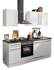 Moderner Küchenblock in Weiß mit Herd, Ofen und Dunstabzugshaube, seitliche Perspektive.