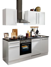 Moderner Küchenblock in Weiß mit Herd, Ofen und Dunstabzugshaube, seitliche Perspektive.