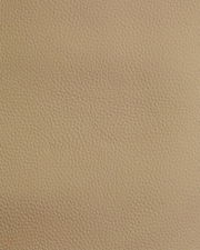 Nahaufnahme einer beige strukturierten Lederoberfläche, verwendet für einen Stuhl.