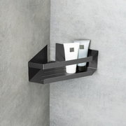 Eckablage Meleto in Gunmetall-Farbe, montiert in einer Ecke, mit zwei Tuben darauf, seitliche Perspektive