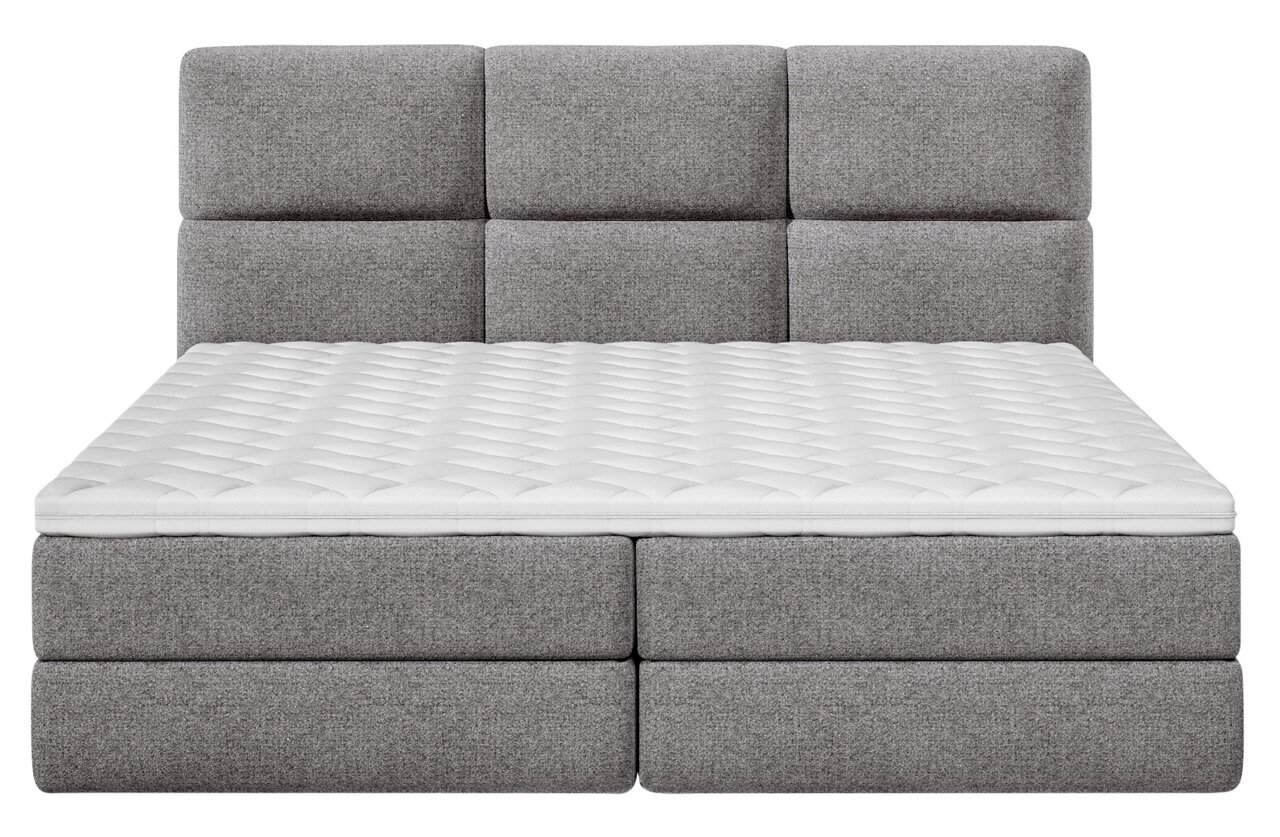 Frontale Ansicht eines grauen Boxspringbetts mit gepolstertem Kopfteil und weißer Matratze.
