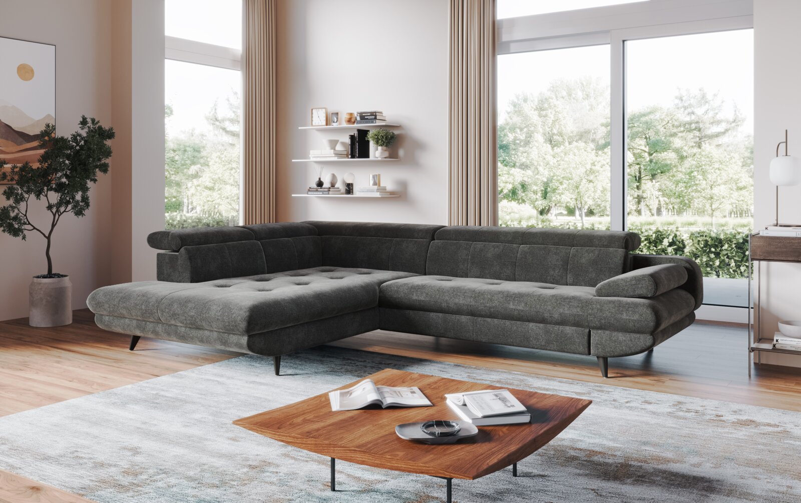 Donkergrijze stoffen hoekbank met brede chaise longue en verstelbare armleuningen in moderne woonkamer, gefotografeerd vanuit een schuin vooraanzicht.