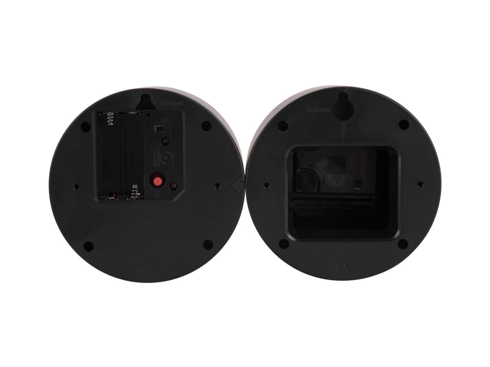 Rückansicht von zwei runden, schwarzen Objekten mit Batteriefach und Schalter, Perspektive von unten.