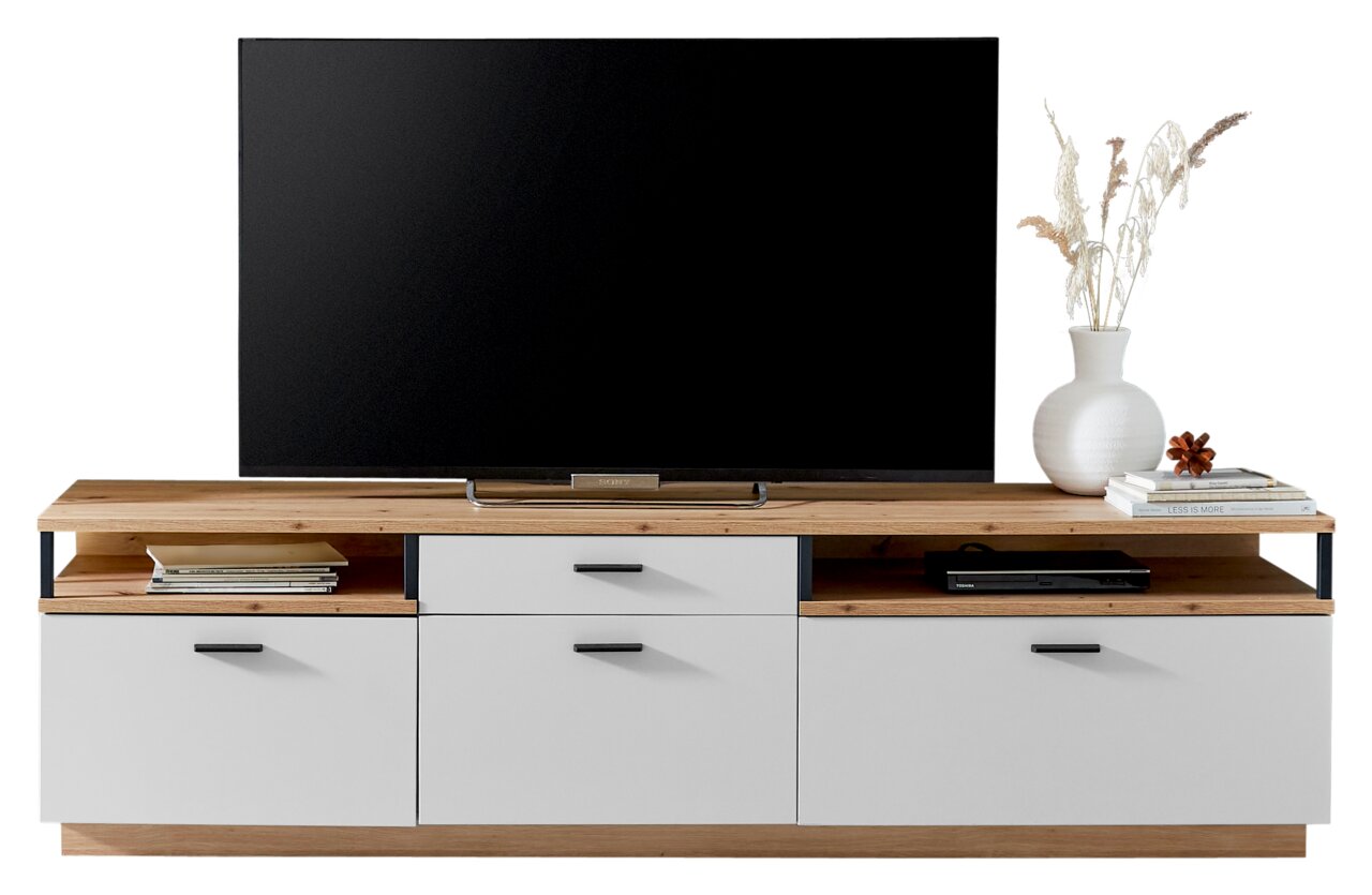 XORA Tv-kast BAMEOS Vooraanzicht van een modern tv-lowboard met houten en witte elementen, versierd met boeken en een vaas.