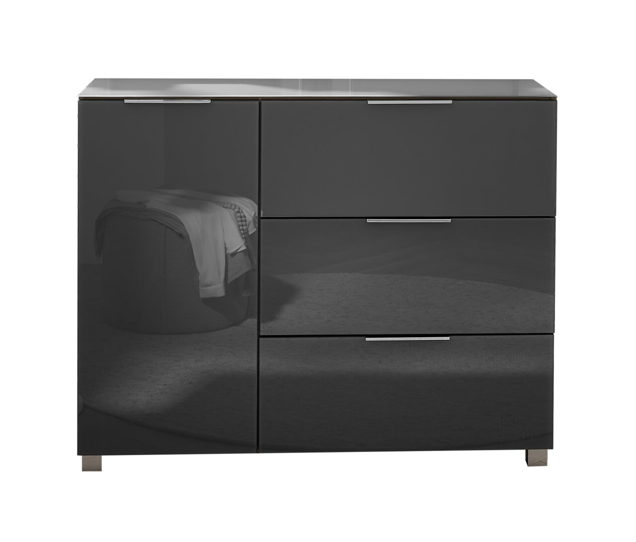 Moderne, dunkelgraue Kommode mit Hochglanzoberfläche, drei Schubladen und einer Tür, frontal abgebildet.