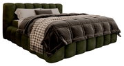 Polsterbettgestell in Olivgrün mit gestepptem Kopfteil und kariertem Überwurf, seitliche Perspektive