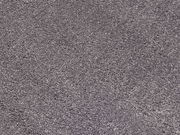 Nahaufnahme eines grauen Uni-Teppichs mit texturierter Oberfläche, von oben betrachtet.