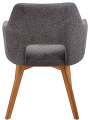 Rückansicht eines grauen Sessels mit Holzbeinen