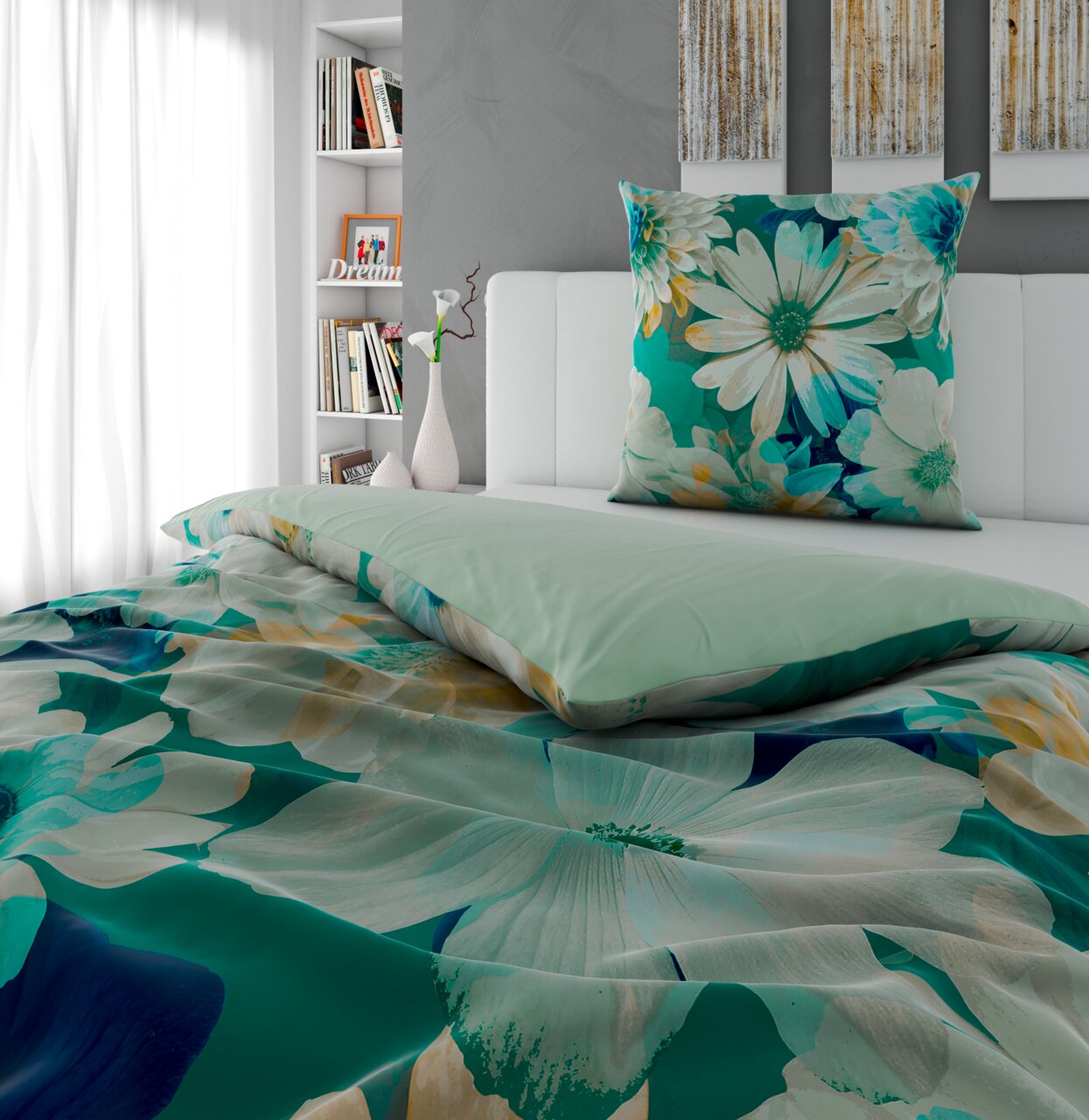 Bio-Vio Wendebettwäsche Bett mit Wendebettwäsche in Grün- und Blautönen mit floralem Muster, seitliche Perspektive