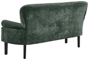 Rückansicht einer grünen Sitzbank mit Samtbezug und schwarzen Beinen