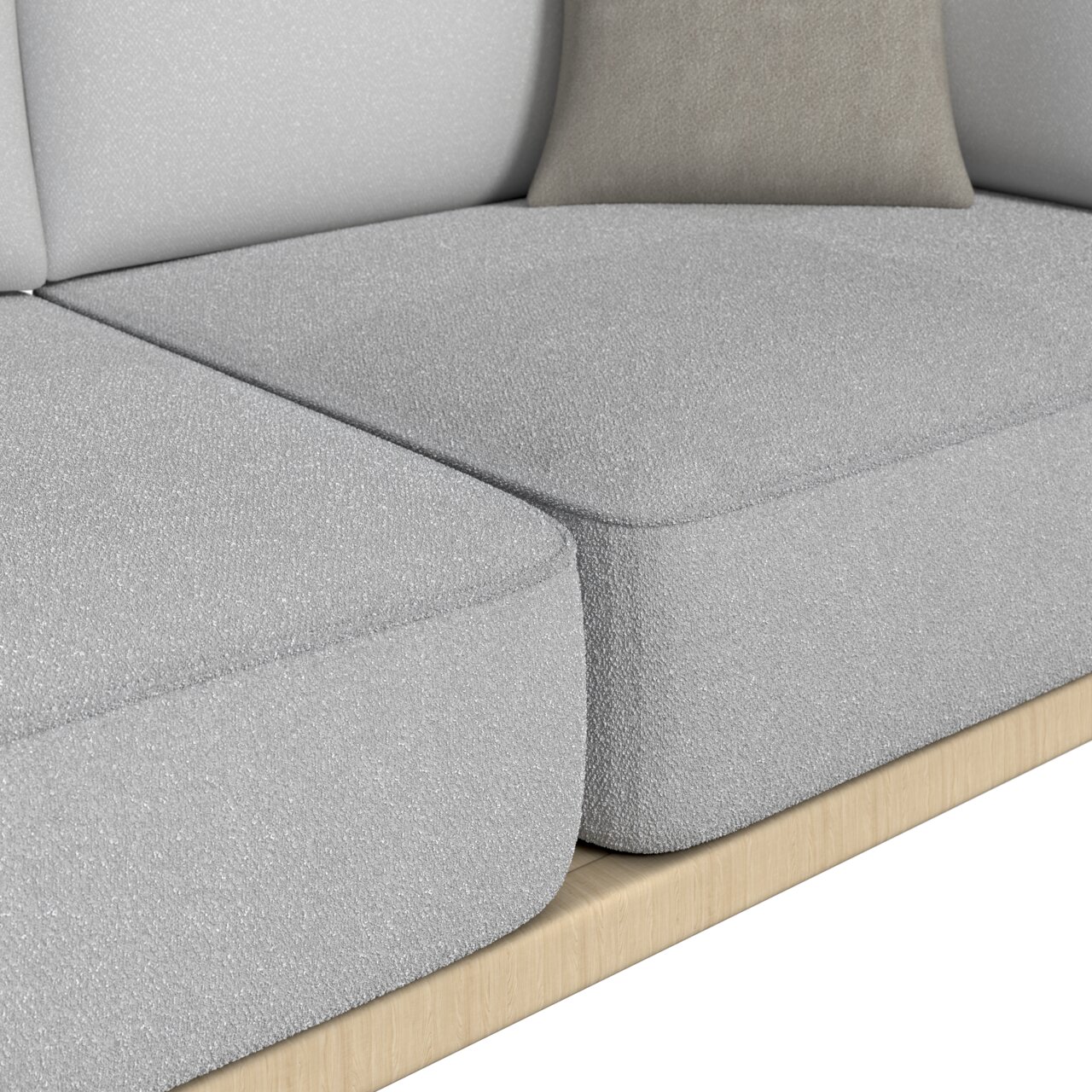 Nahaufnahme eines grauen Loungesofas mit zwei Sitzplätzen, seitliche Perspektive