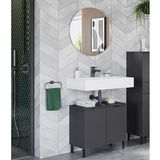 Moderner Waschbeckenunterschrank in dunklem Design, frontal abgebildet unter einem rechteckigen Waschbecken mit rundem Spiegel darüber.