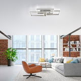 Moderne Deckenleuchte aus Stahl in einem stilvollen Wohnzimmer, Perspektive von unten.